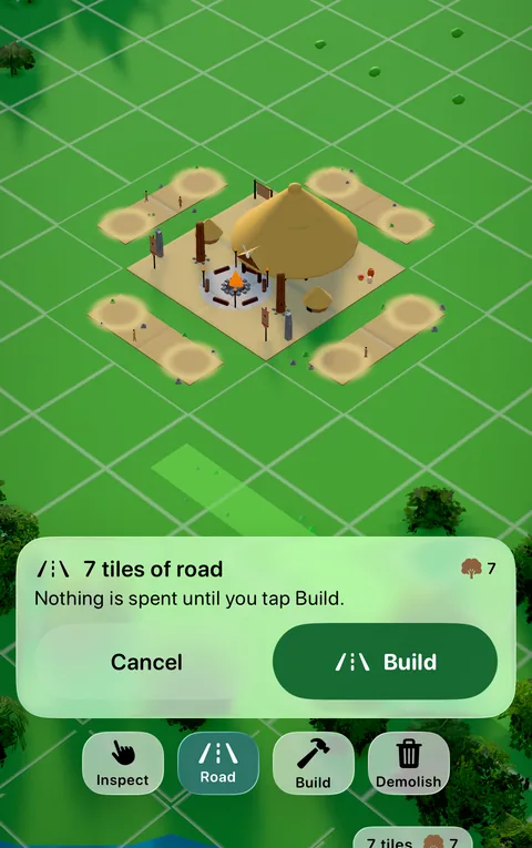 Drawing a road in the game: seven new tiles of road wait on the grass, with the confirm bar reading Nothing is spent until you tap Build.